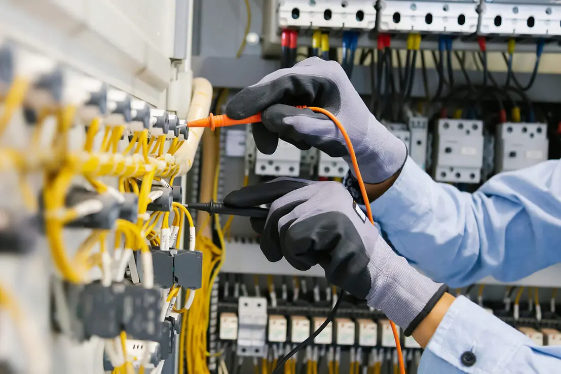 Engineer working on an electrical panel